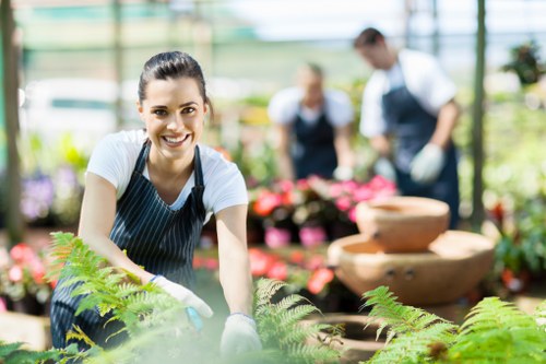 Local Blackfriars garden services working on diverse plants